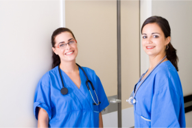 two nurse smiling